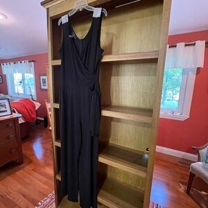 Black sleeveless jumpsuit, front tie